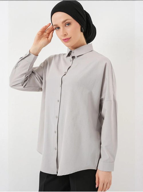 Camisa de popelina relaxed fit com fecho de botões bdart - Kiabi Camisa de popelina relaxed fit com fecho de botões bdart - Kiabi