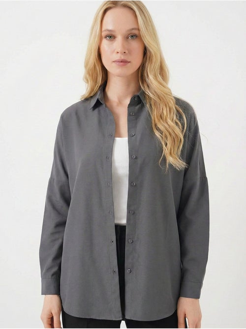 Camisa de popelina relaxed fit com fecho de botões bdart - Kiabi Camisa de popelina relaxed fit com fecho de botões bdart - Kiabi