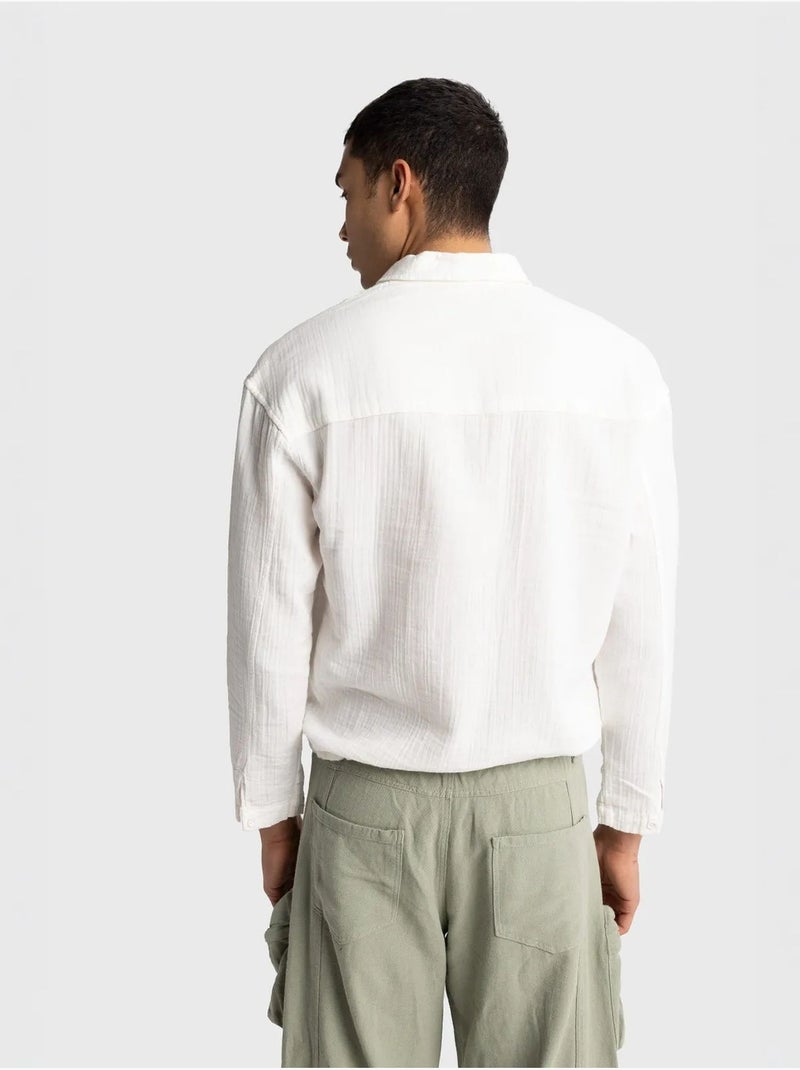 Camisa em algodão de mangas compridas de ajuste descontraído com detalhe de laço giesto Branco - Kiabi