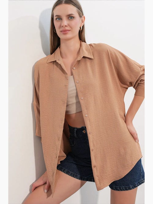 Camisa feminina de poliéster elástico bdart - Kiabi Camisa feminina de poliéster elástico bdart - Kiabi