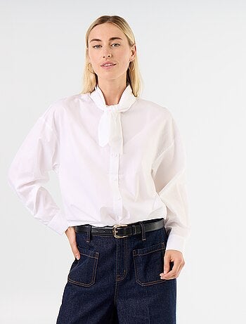 Camisa larga de manga comprida e gola com laço