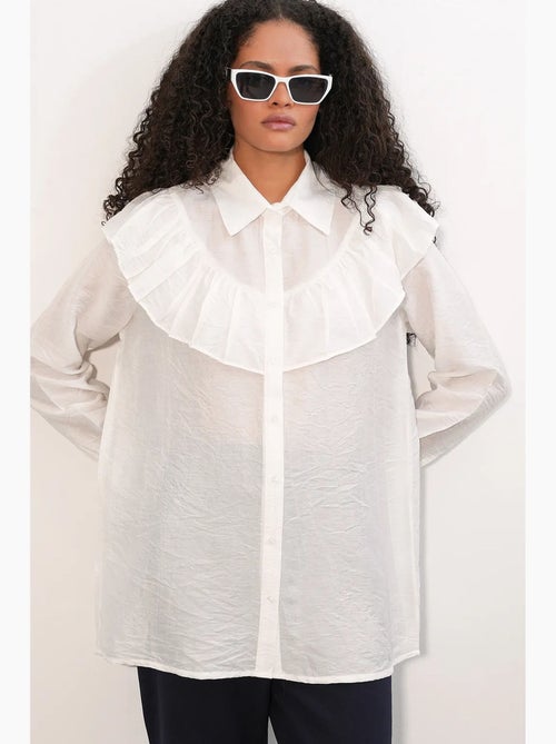 Camisa longa relaxed com detalhe de folho bdart - Kiabi Camisa longa relaxed com detalhe de folho bdart - Kiabi