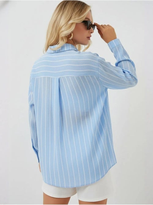Camisa oversize texturizada às riscas com fecho de botões bdart - Kiabi Camisa oversize texturizada às riscas com fecho de botões bdart - Kiabi
