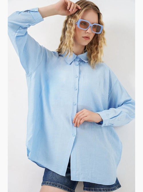 Camisa oversized abotoada de manga comprida bdart - Kiabi Camisa oversized abotoada de manga comprida bdart - Kiabi