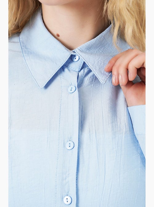 Camisa oversized abotoada de manga comprida bdart - Kiabi Camisa oversized abotoada de manga comprida bdart - Kiabi