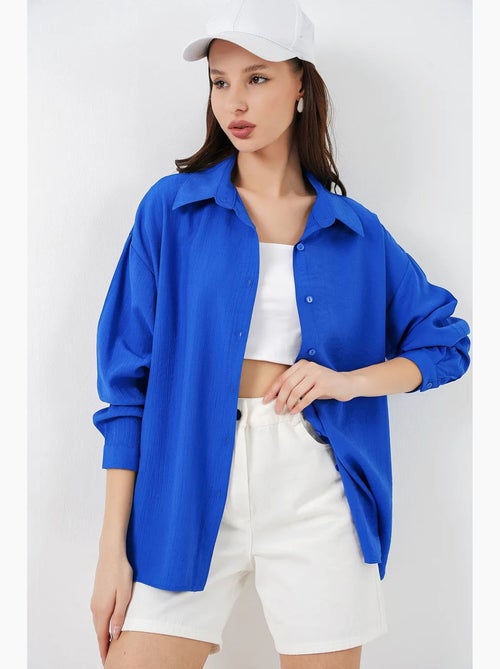 Camisa oversized abotoada de manga comprida bdart - Kiabi Camisa oversized abotoada de manga comprida bdart - Kiabi