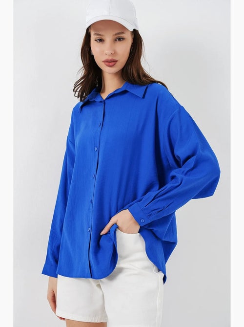 Camisa oversized abotoada de manga comprida bdart - Kiabi Camisa oversized abotoada de manga comprida bdart - Kiabi