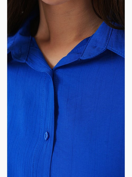 Camisa oversized abotoada de manga comprida bdart - Kiabi Camisa oversized abotoada de manga comprida bdart - Kiabi