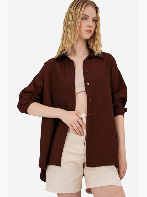 Camisa oversized abotoada de manga comprida bdart - Kiabi Camisa oversized abotoada de manga comprida bdart - Kiabi