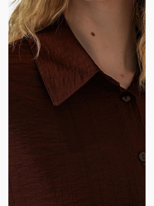 Camisa oversized abotoada de manga comprida bdart - Kiabi Camisa oversized abotoada de manga comprida bdart - Kiabi