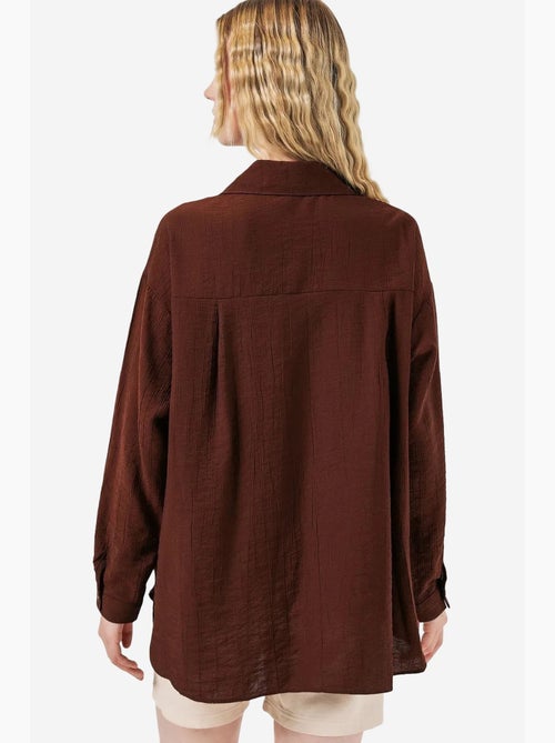 Camisa oversized abotoada de manga comprida bdart - Kiabi Camisa oversized abotoada de manga comprida bdart - Kiabi