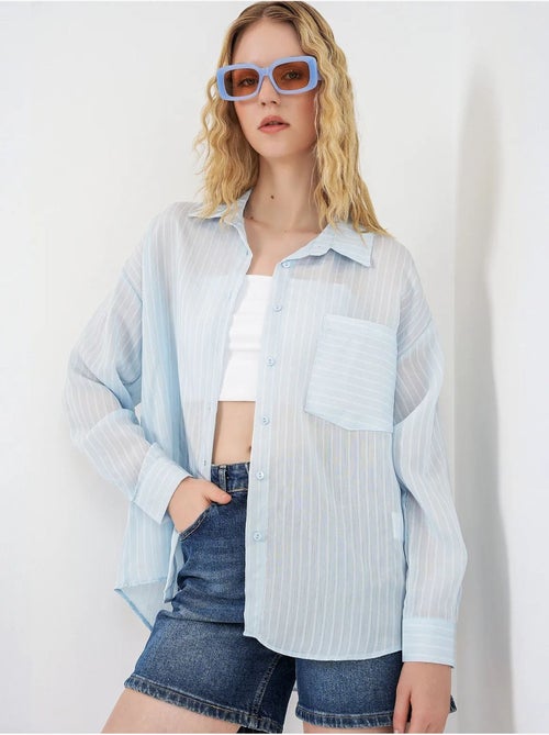 Camisa oversized às riscas com abotoamento frontal bdart - Kiabi Camisa oversized às riscas com abotoamento frontal bdart - Kiabi