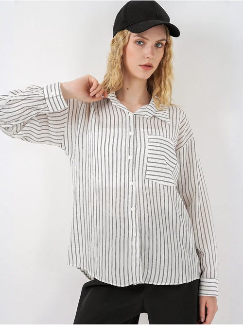 Camisa oversized às riscas com abotoamento frontal bdart - Kiabi Camisa oversized às riscas com abotoamento frontal bdart - Kiabi