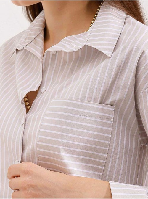 Camisa oversized às riscas com bolso bdart - Kiabi Camisa oversized às riscas com bolso bdart - Kiabi