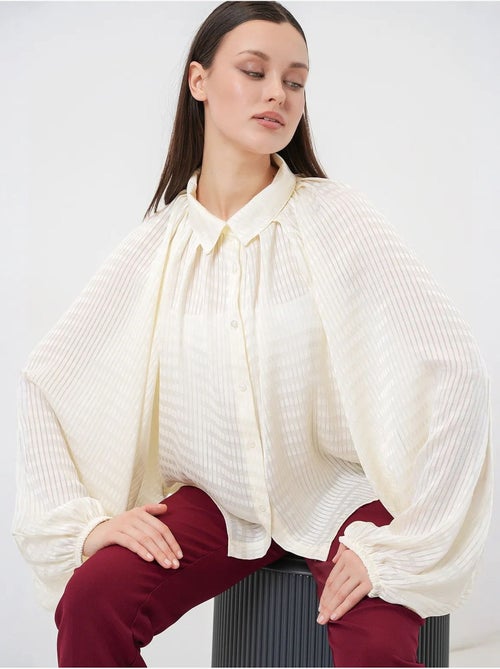 Camisa oversized às riscas com botões bdart - Kiabi Camisa oversized às riscas com botões bdart - Kiabi