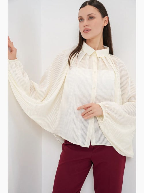 Camisa oversized às riscas com botões bdart - Kiabi Camisa oversized às riscas com botões bdart - Kiabi