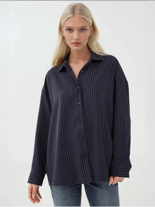 Camisa oversized às riscas hiccup - Kiabi Camisa oversized às riscas hiccup - Kiabi