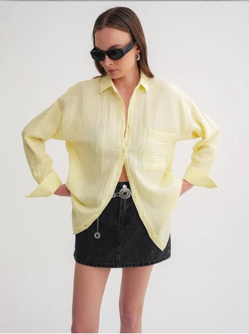 Camisa oversized com detalhe de bolso mixray - Kiabi Camisa oversized com detalhe de bolso mixray - Kiabi