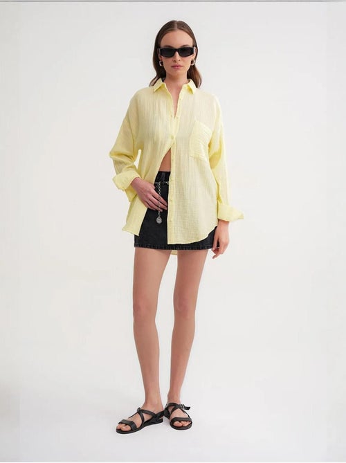 Camisa oversized com detalhe de bolso mixray - Kiabi Camisa oversized com detalhe de bolso mixray - Kiabi
