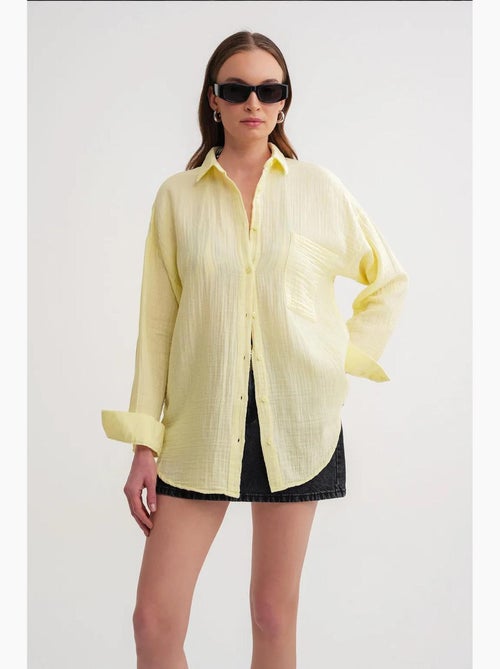 Camisa oversized com detalhe de bolso mixray - Kiabi Camisa oversized com detalhe de bolso mixray - Kiabi