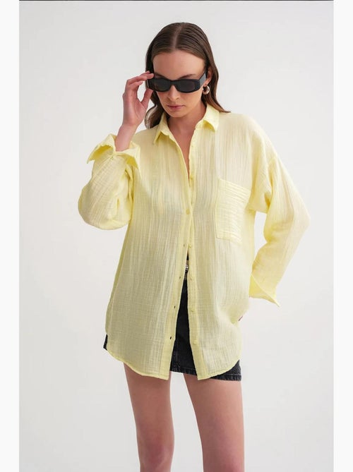 Camisa oversized com detalhe de bolso mixray - Kiabi Camisa oversized com detalhe de bolso mixray - Kiabi