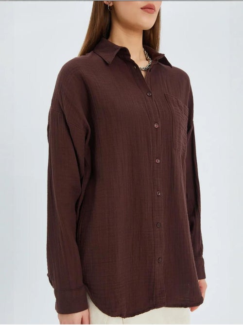 Camisa oversized com detalhe de bolso mixray - Kiabi Camisa oversized com detalhe de bolso mixray - Kiabi