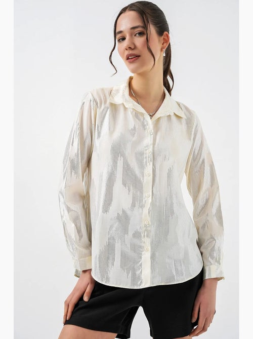 Camisa oversized com estampado abstrato e abotoamento frontal bdart - Kiabi Camisa oversized com estampado abstrato e abotoamento frontal bdart - Kiabi