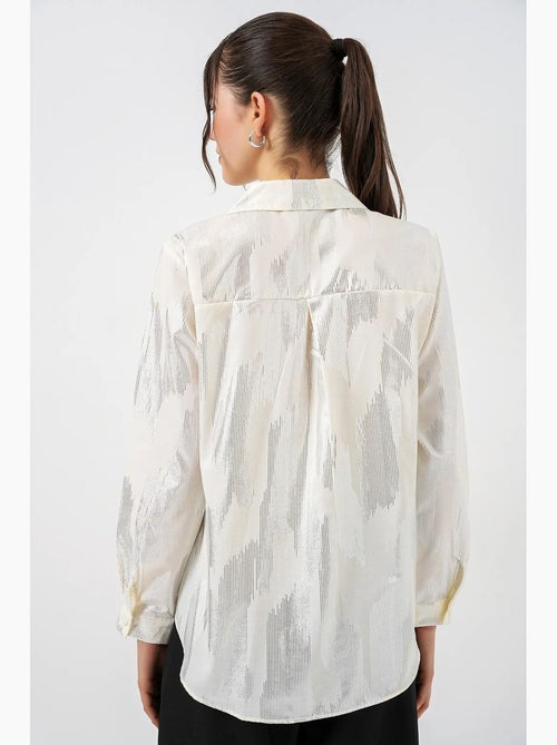 Camisa oversized com estampado abstrato e abotoamento frontal bdart - Kiabi Camisa oversized com estampado abstrato e abotoamento frontal bdart - Kiabi