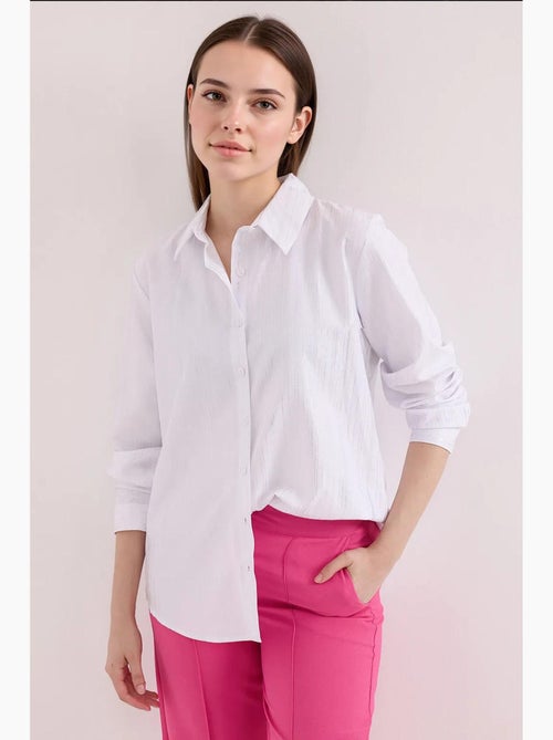 Camisa oversized com estampado abstrato e abotoamento frontal bdart - Kiabi Camisa oversized com estampado abstrato e abotoamento frontal bdart - Kiabi