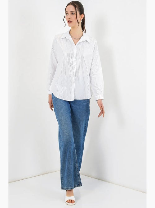 Camisa oversized com estampado abstrato e abotoamento frontal bdart - Kiabi Camisa oversized com estampado abstrato e abotoamento frontal bdart - Kiabi