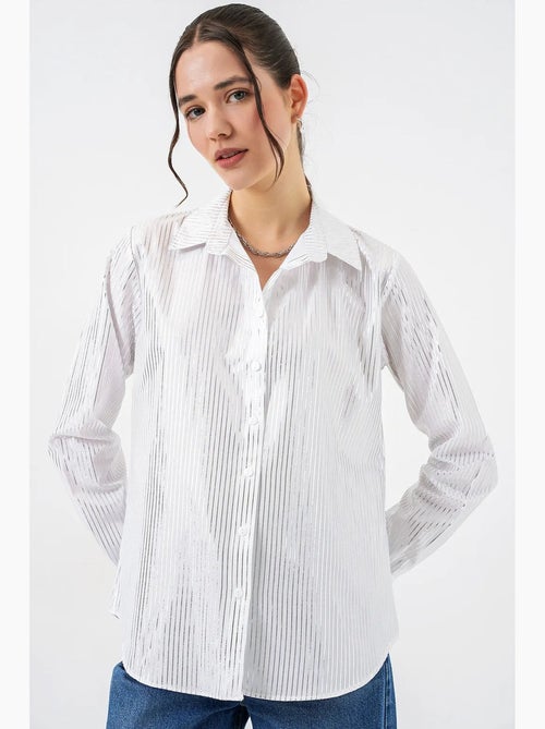 Camisa oversized com estampado abstrato e abotoamento frontal bdart - Kiabi Camisa oversized com estampado abstrato e abotoamento frontal bdart - Kiabi