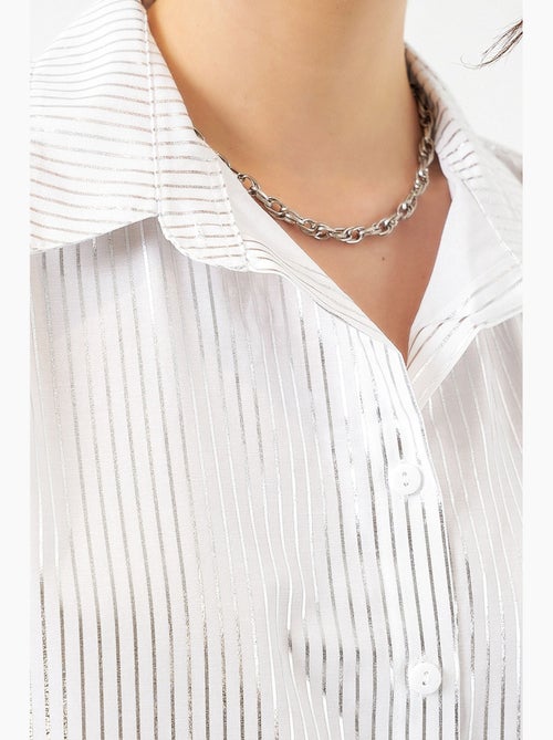 Camisa oversized com estampado abstrato e abotoamento frontal bdart - Kiabi Camisa oversized com estampado abstrato e abotoamento frontal bdart - Kiabi