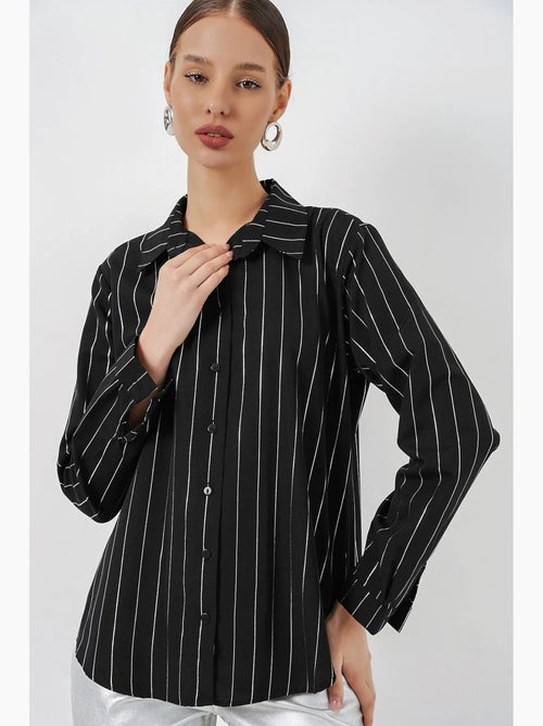 Camisa oversized com estampado abstrato e abotoamento frontal bdart - Kiabi Camisa oversized com estampado abstrato e abotoamento frontal bdart - Kiabi