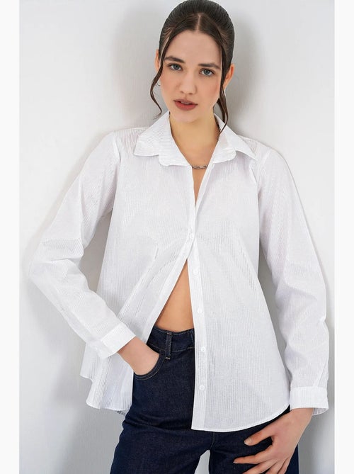 Camisa oversized com estampado abstrato e abotoamento frontal bdart - Kiabi Camisa oversized com estampado abstrato e abotoamento frontal bdart - Kiabi