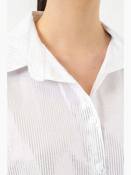 Camisa oversized com estampado abstrato e abotoamento frontal bdart - Kiabi Camisa oversized com estampado abstrato e abotoamento frontal bdart - Kiabi