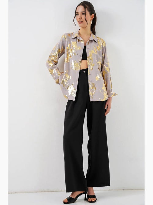 Camisa oversized com estampado abstrato e abotoamento frontal bdart - Kiabi Camisa oversized com estampado abstrato e abotoamento frontal bdart - Kiabi