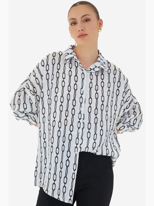 Camisa oversized de cetim com botões à frente bdart - Kiabi Camisa oversized de cetim com botões à frente bdart - Kiabi