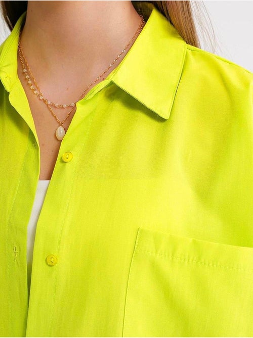 Camisa oversized de popelina com botões e manga comprida mixray - Kiabi Camisa oversized de popelina com botões e manga comprida mixray - Kiabi