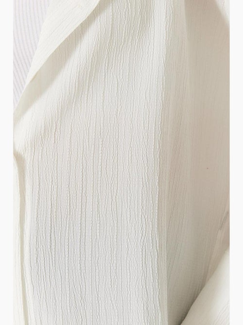 Camisa oversized texturizada lucci - Kiabi Camisa oversized texturizada lucci - Kiabi
