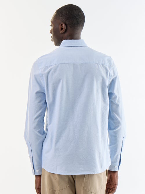 Camisa oxford com abertura abotoada - Kiabi Camisa oxford com abertura abotoada - Kiabi