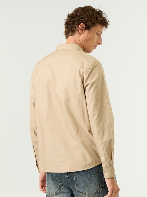Camisa oxford com abertura abotoada - Kiabi Camisa oxford com abertura abotoada - Kiabi