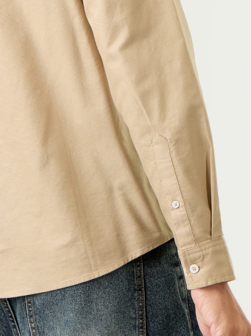 Camisa oxford com abertura abotoada - Kiabi Camisa oxford com abertura abotoada - Kiabi