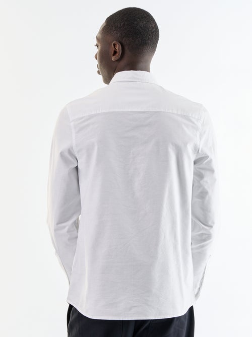 Camisa oxford com abertura abotoada - Kiabi Camisa oxford com abertura abotoada - Kiabi