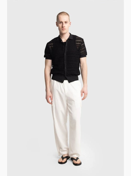 Camisa polo de malha texturada com fecho de botões giesto - Kiabi Camisa polo de malha texturada com fecho de botões giesto - Kiabi