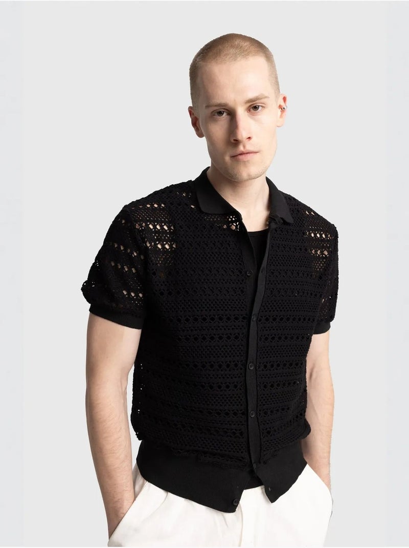 Camisa polo de malha texturada com fecho de botões giesto Preto - Kiabi