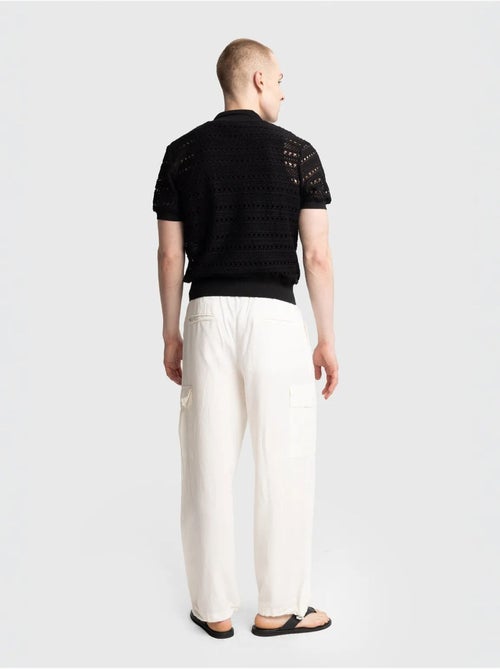 Camisa polo de malha texturada com fecho de botões giesto - Kiabi Camisa polo de malha texturada com fecho de botões giesto - Kiabi