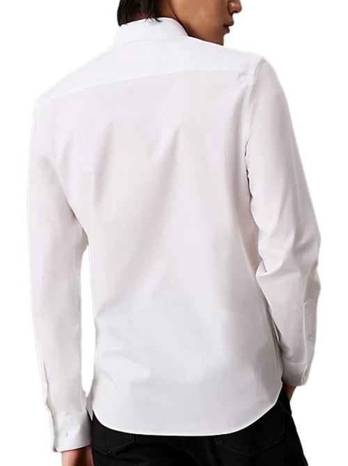 Camisa Poplin Stretch Calvin Klein Jeans para Homem Branca/Preta - Kiabi Camisa Poplin Stretch Calvin Klein Jeans para Homem Branca/Preta - Kiabi