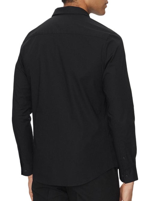 Camisa Preta Calvin Klein Jeans Sólida para Homem - Kiabi Camisa Preta Calvin Klein Jeans Sólida para Homem - Kiabi