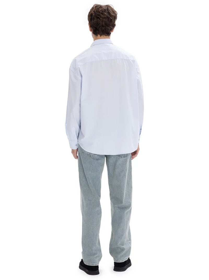 Camisa regular fit com colarinho abotoado e bolso giesto Azul-pastel - Kiabi