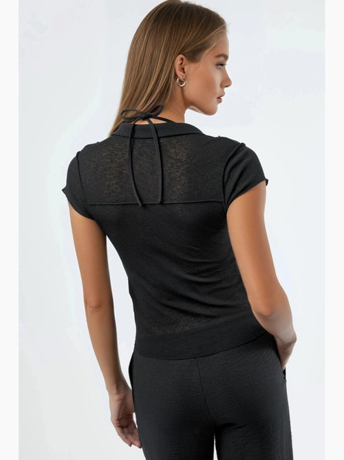 Camisa texturada de manga curta com botões busem - Kiabi Camisa texturada de manga curta com botões busem - Kiabi
